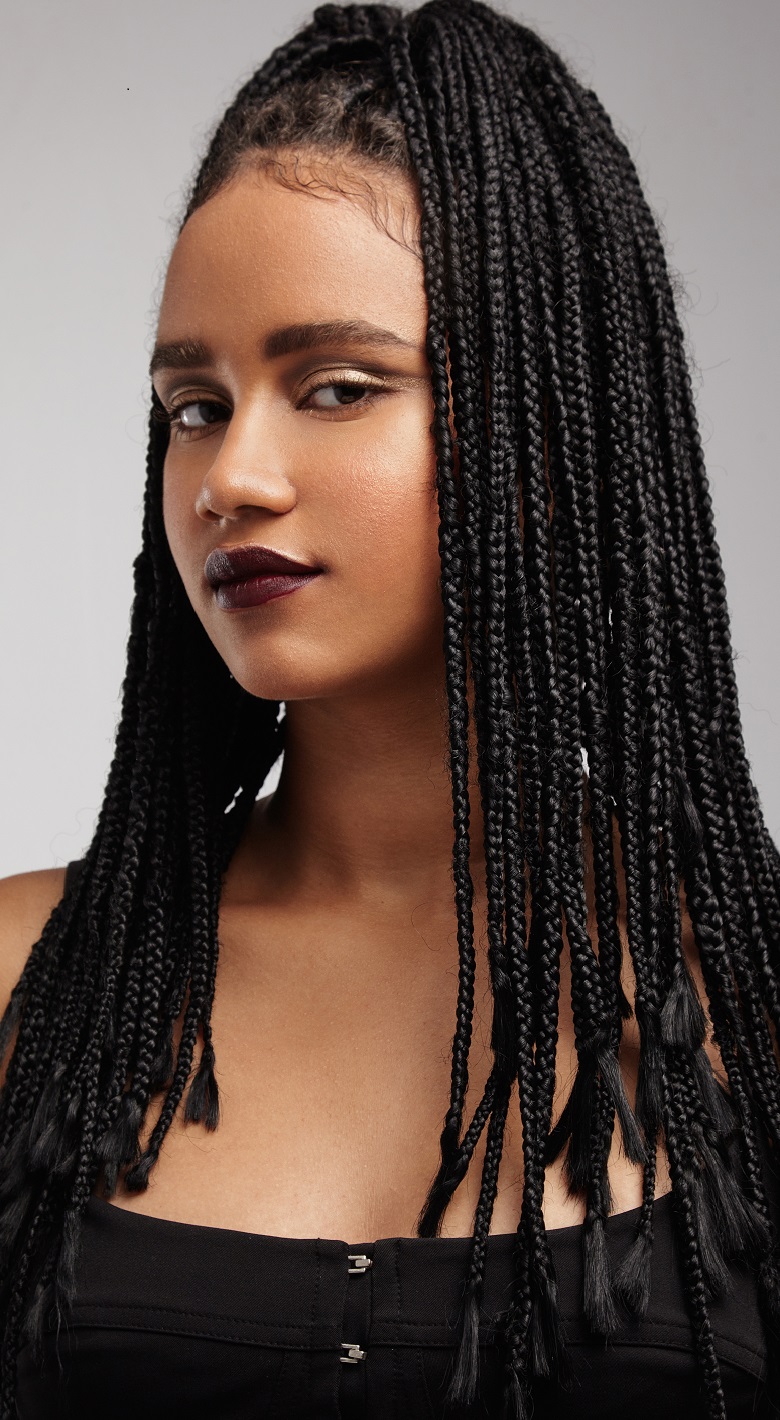 serious black woman with braids